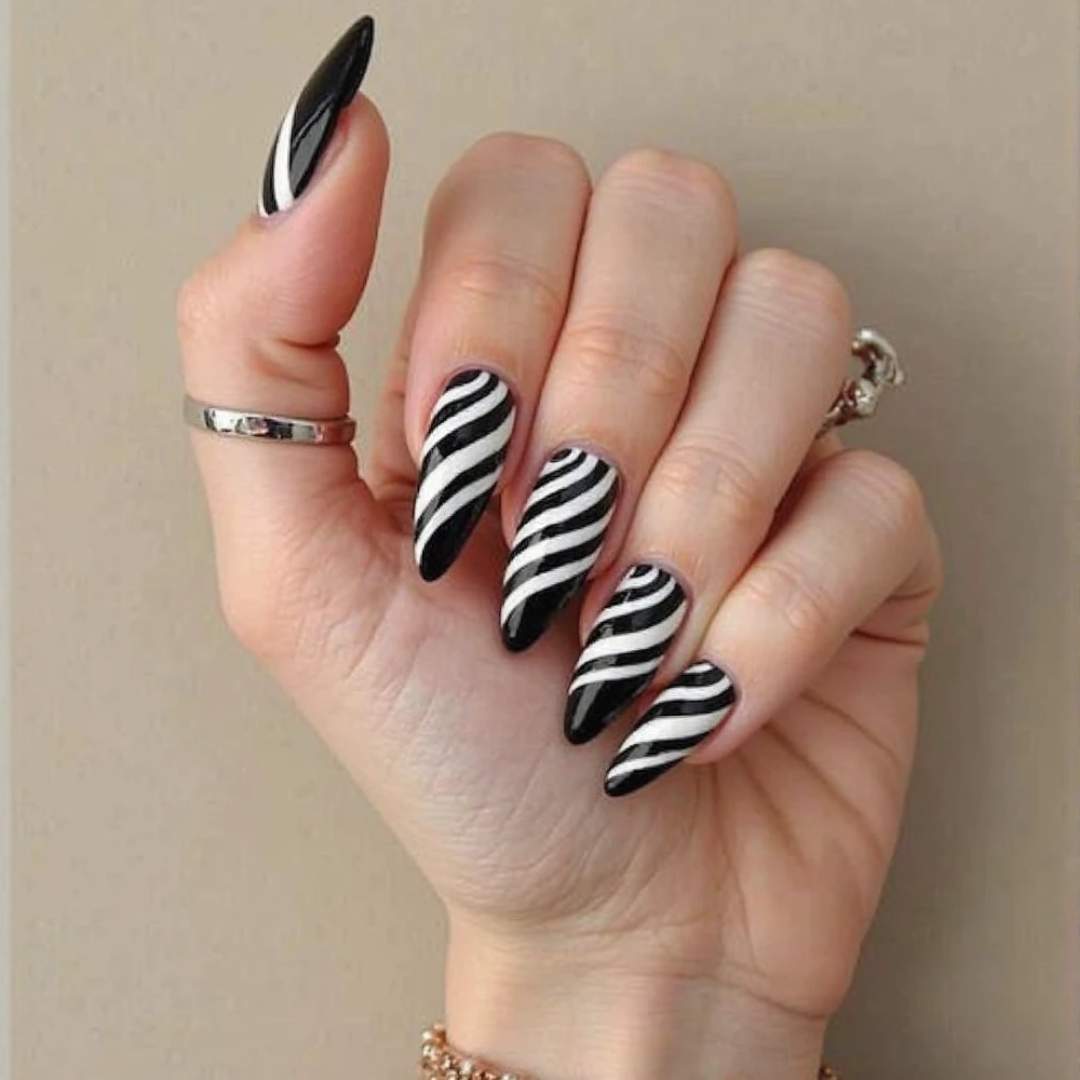 classic and timeless black and white zebra nails nail styling showcasing beautiful hues on stylish nail design, with wild zebra print nail design