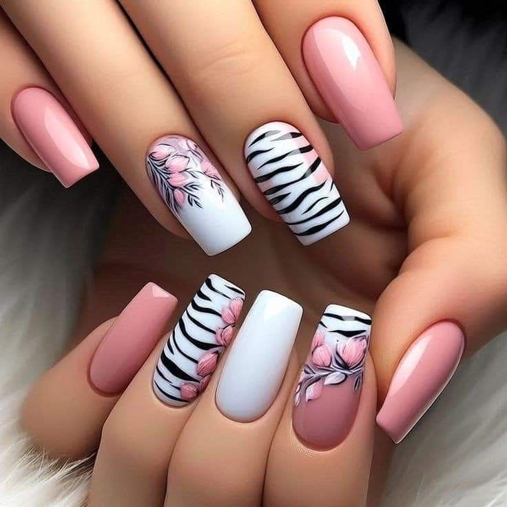 stunning and eye-catching pink and white zebra nails manicure style featuring refined color selection with sophisticated nail styling, with wild zebra print nail design