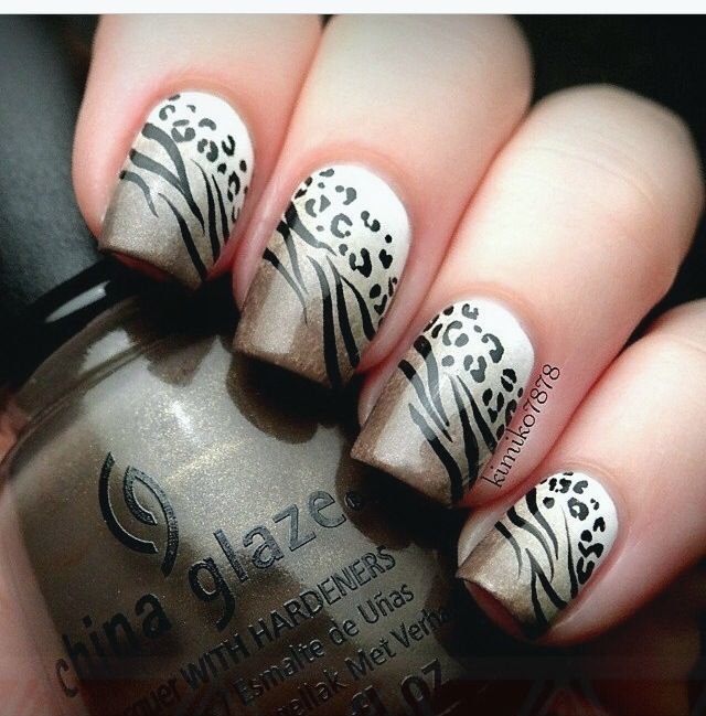elegant and sophisticated short zebra nails manicure style featuring refined color selection with refined nail aesthetics, with wild zebra print nail design