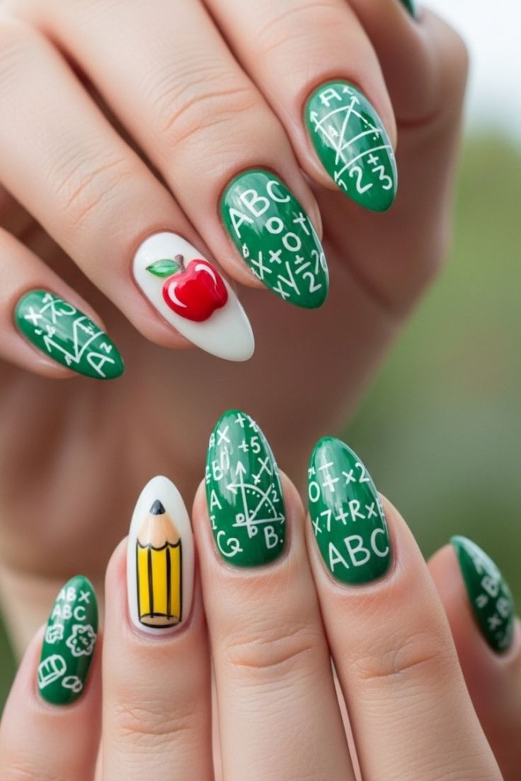 Matte black square nails with hand-painted white chalk math symbols for back to school look.