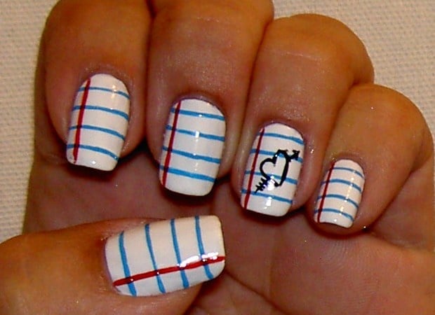 Square white nails with horizontal blue lined notebook lines and red margin paint art.