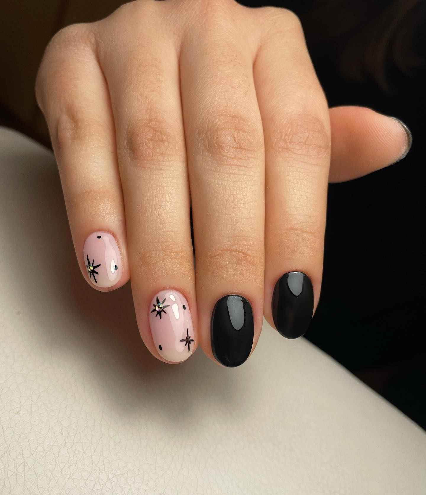 Black Starburst Short Almond Nails