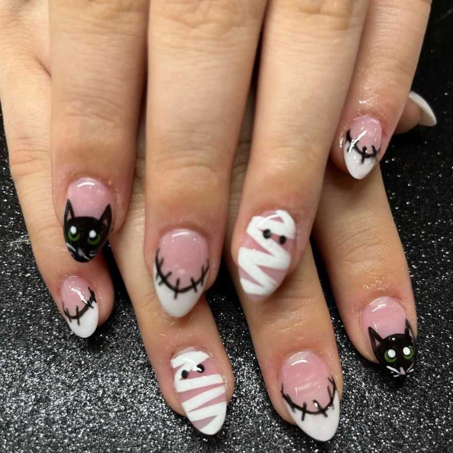 Black Cat Green Eyes And Mummy Almond Halloween Nails