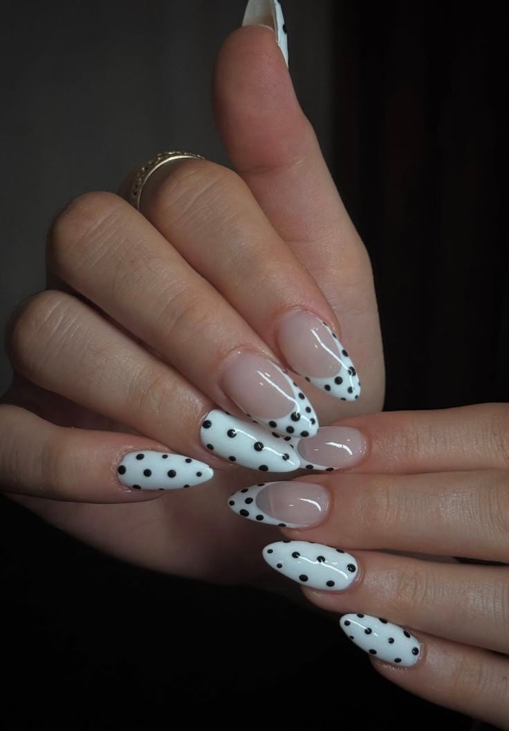 Winter blue snowflake french tip nails on coffin glossy polish for holiday winter events.