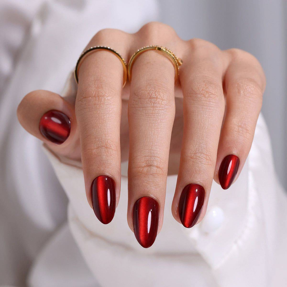 Burgundy Cat Eye Almond Nails
