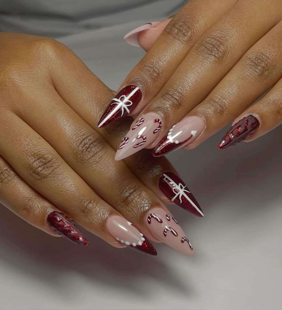 Burgundy Glitter Bow Nails