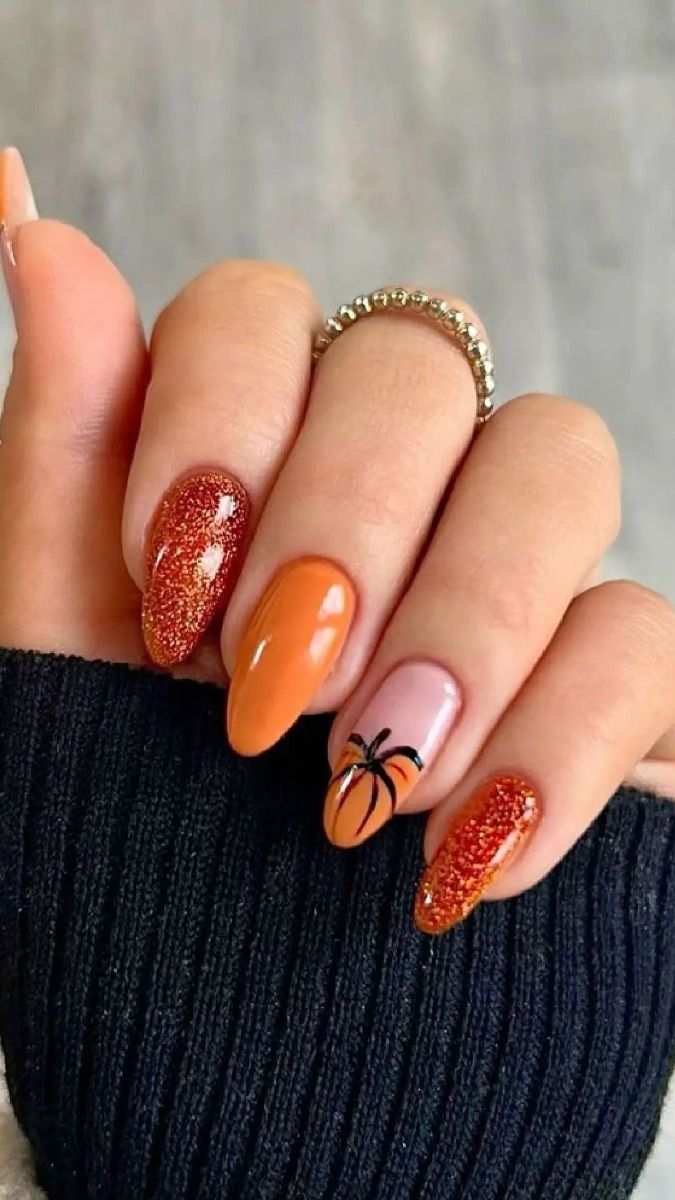 Burnt Orange Glitter And Pumpkin Line Art Accent Almond Nails