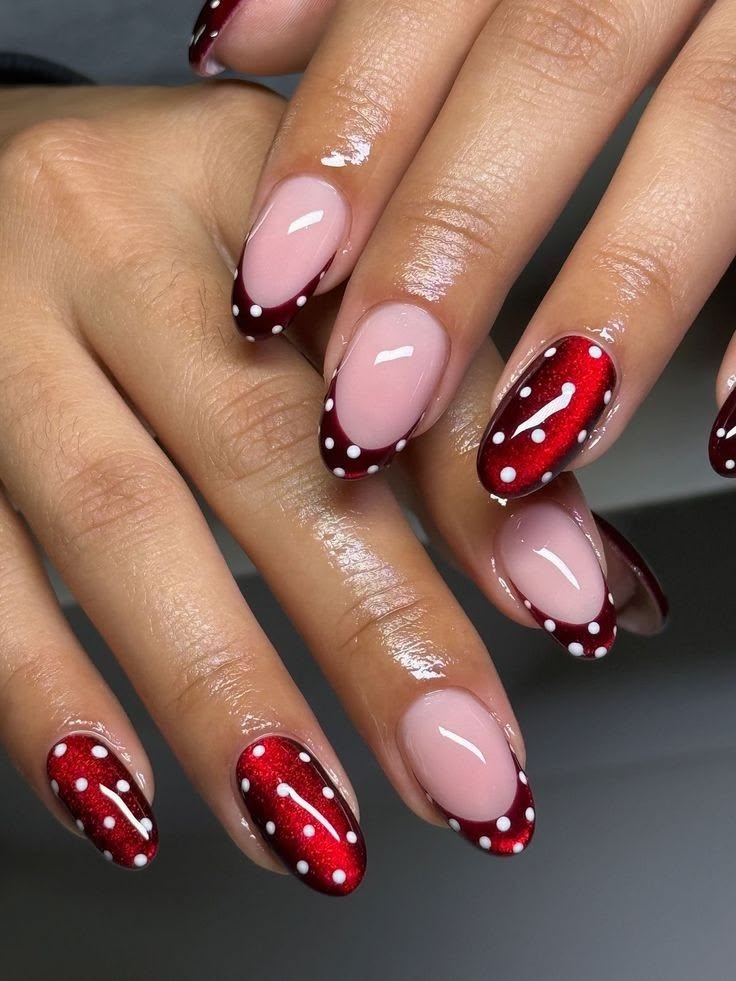 Cherry red french tip nails with white dots on short square glossy gel for casual summer.