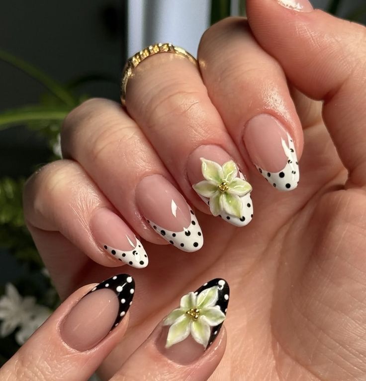 Soft yellow daisy french tip nails on oval glossy base ideal for spring celebrations.