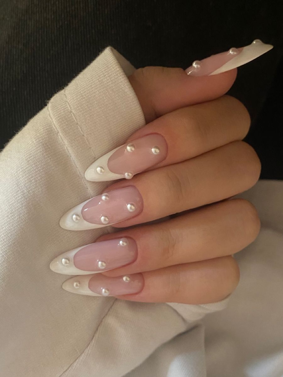 Medium square milky white pearl and rhinestone nails with glossy finish for wedding guests.
