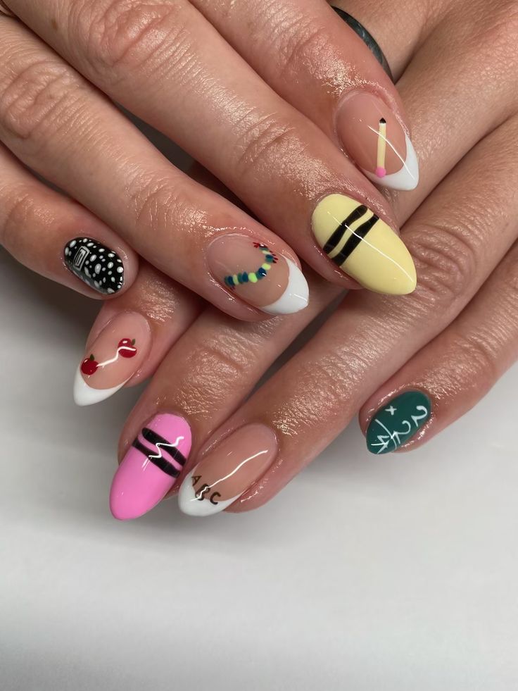 Short square bright nails with primary polka dots and alphabet lettering for school.
