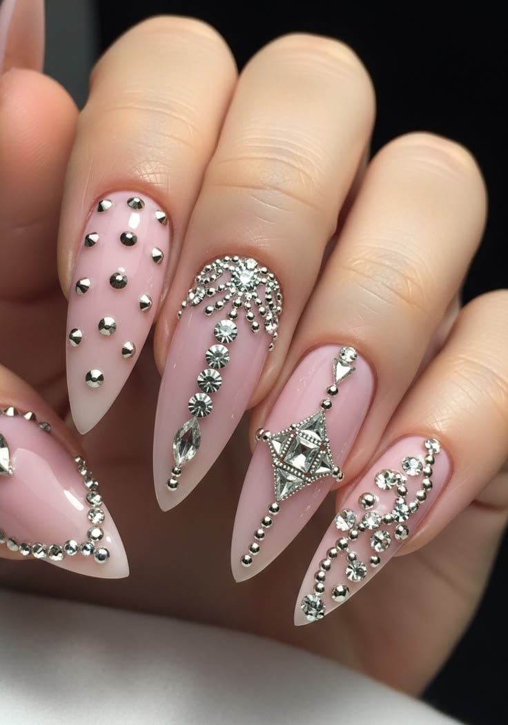 Long coffin crystal cluster rhinestone nails with glossy gel topcoat for festive occasions.