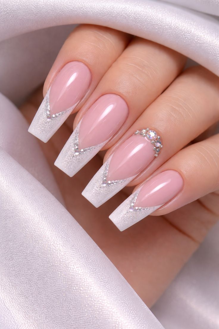 Medium almond glitter fade rhinestone nails with glass shine finish for holiday parties.