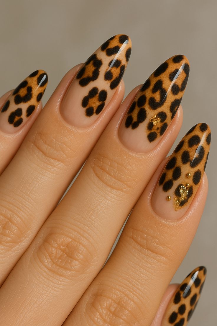 Glossy Leopard Print Almond Nails With Gold Glam Accents