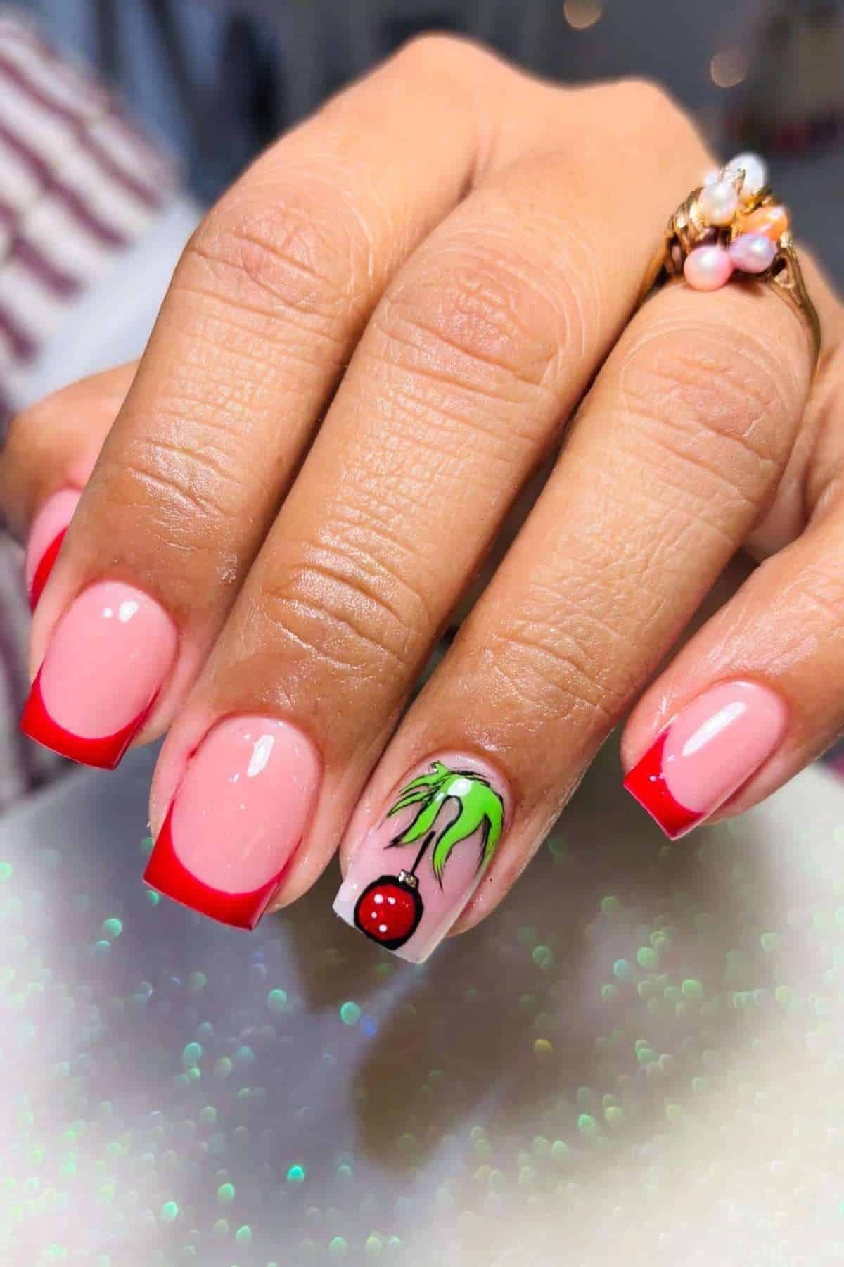 Grinch Hand Pink Red Nails