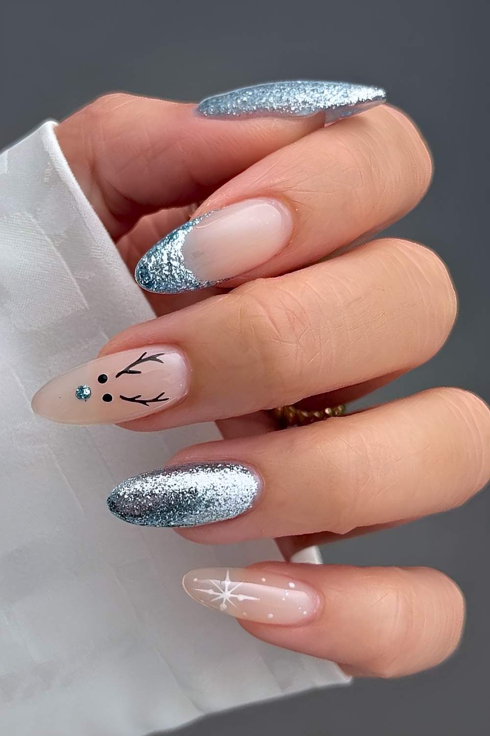 Icy Blue Glitter Reindeer Nails