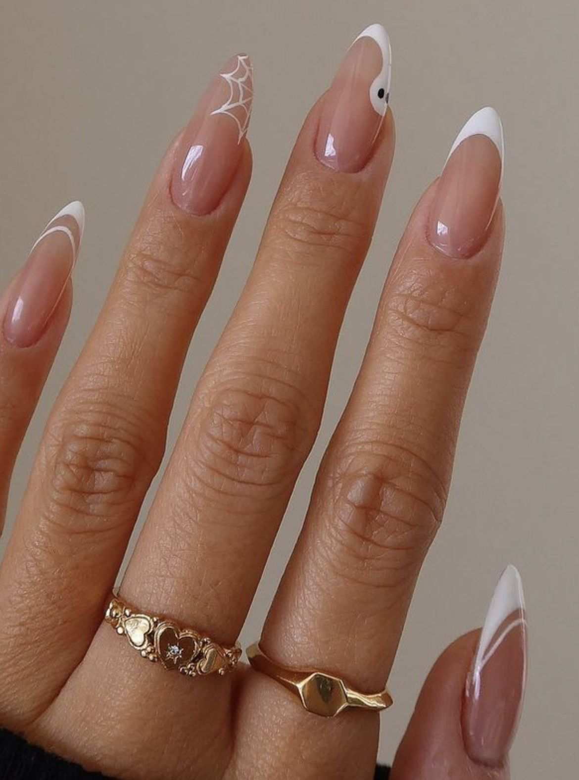 Minimalist White French Tip Ghost And Spiderweb Almond Nails