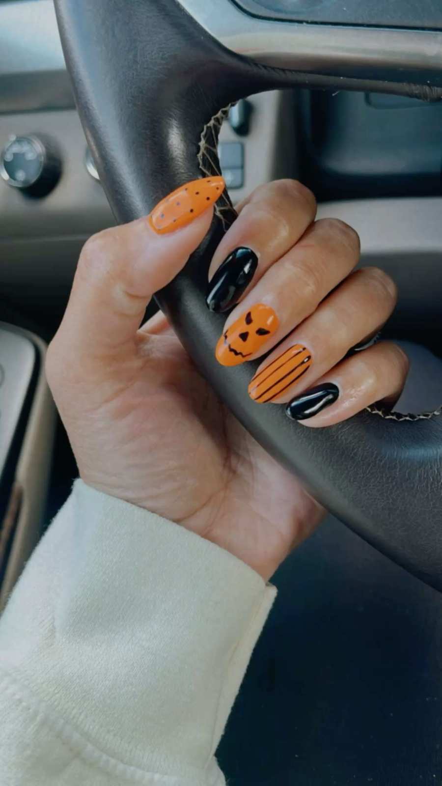 Orange Pumpkin Face And Stripes Halloween Nails