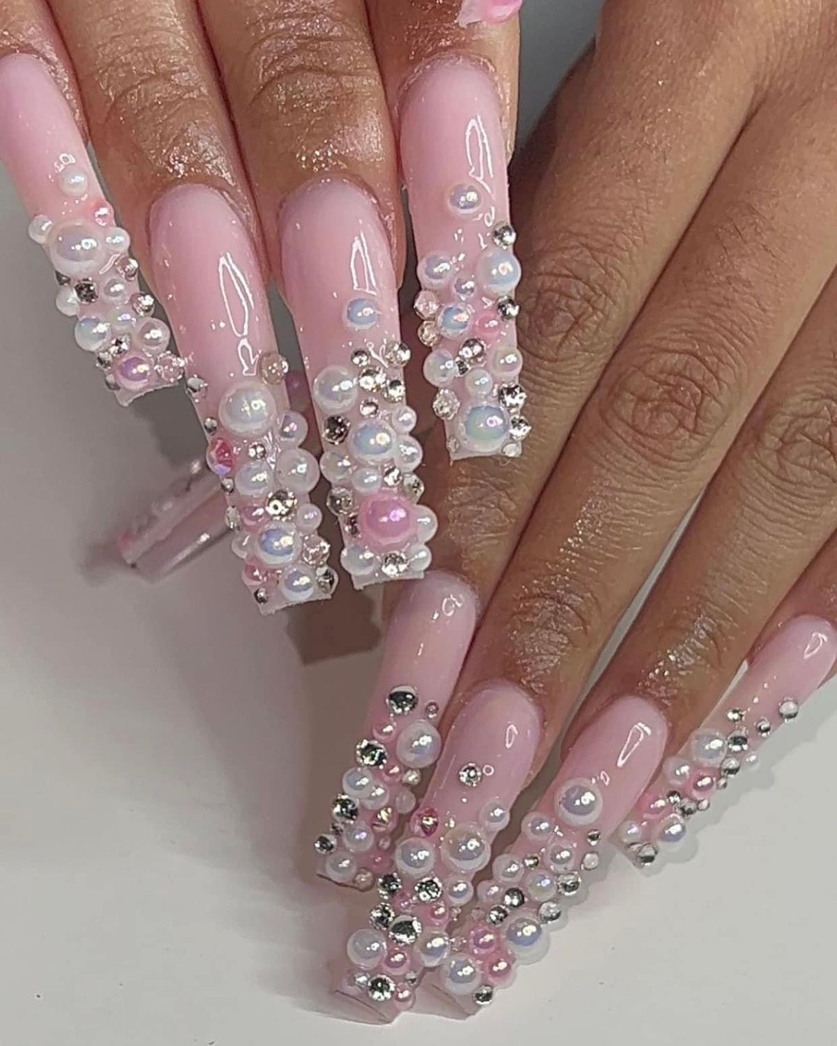 Medium coffin classic baby pink rhinestone nails with glass gloss finish for everyday glam.