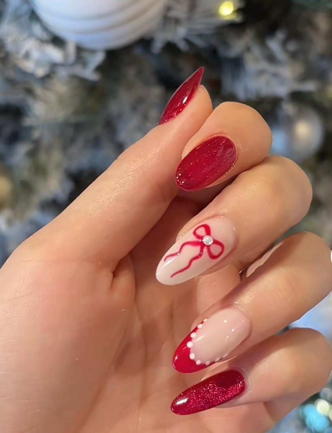 Red Glitter Almond Nails With Coquette Ribbon Bow And Pearl Dots