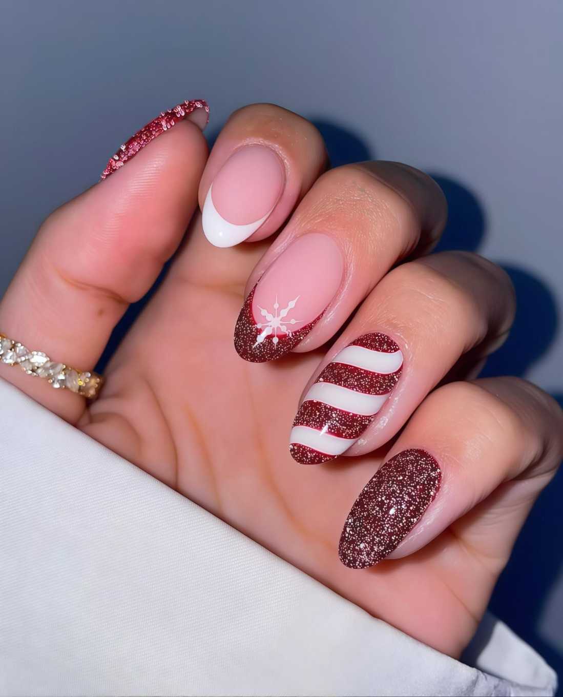 Red Glitter Candy Cane Swirl And Snowflake French Almond Nails
