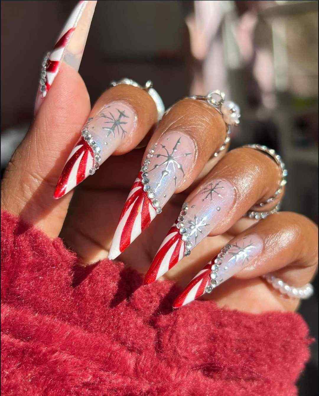 Red White Candy Swirl Stiletto Nails
