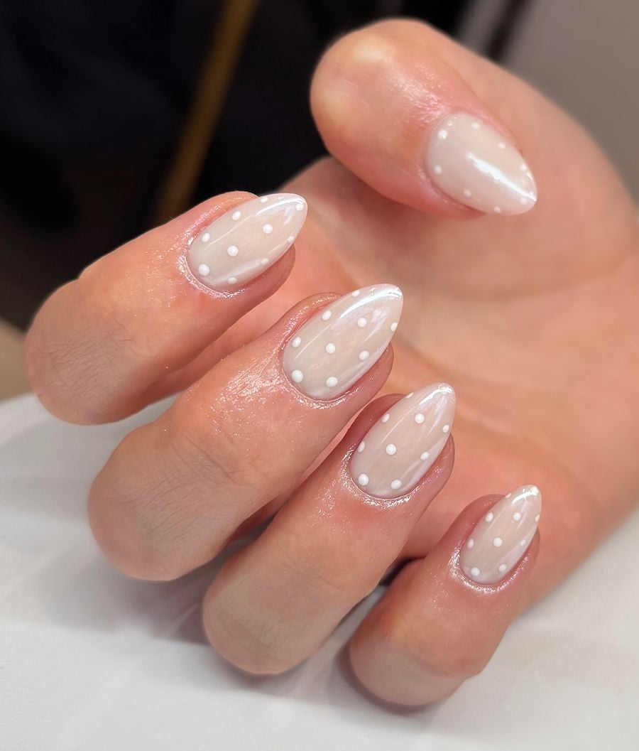 Short square shaped ultra sheer milky white nails for everyday office wear.