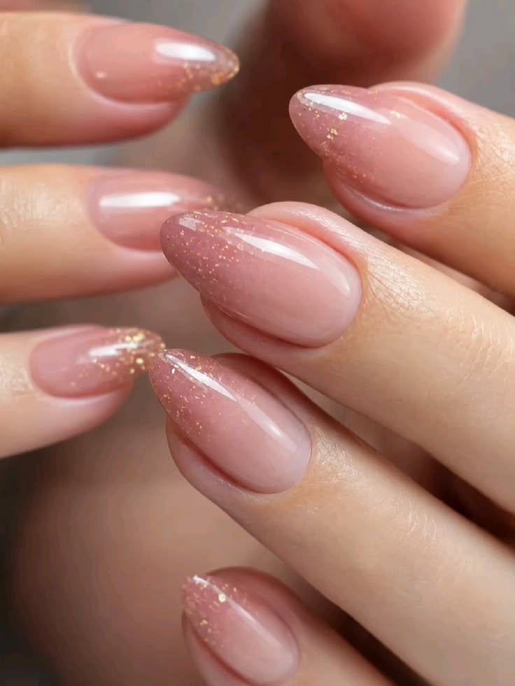 Soft Pink Ombre Nails With Delicate Gold Shimmer