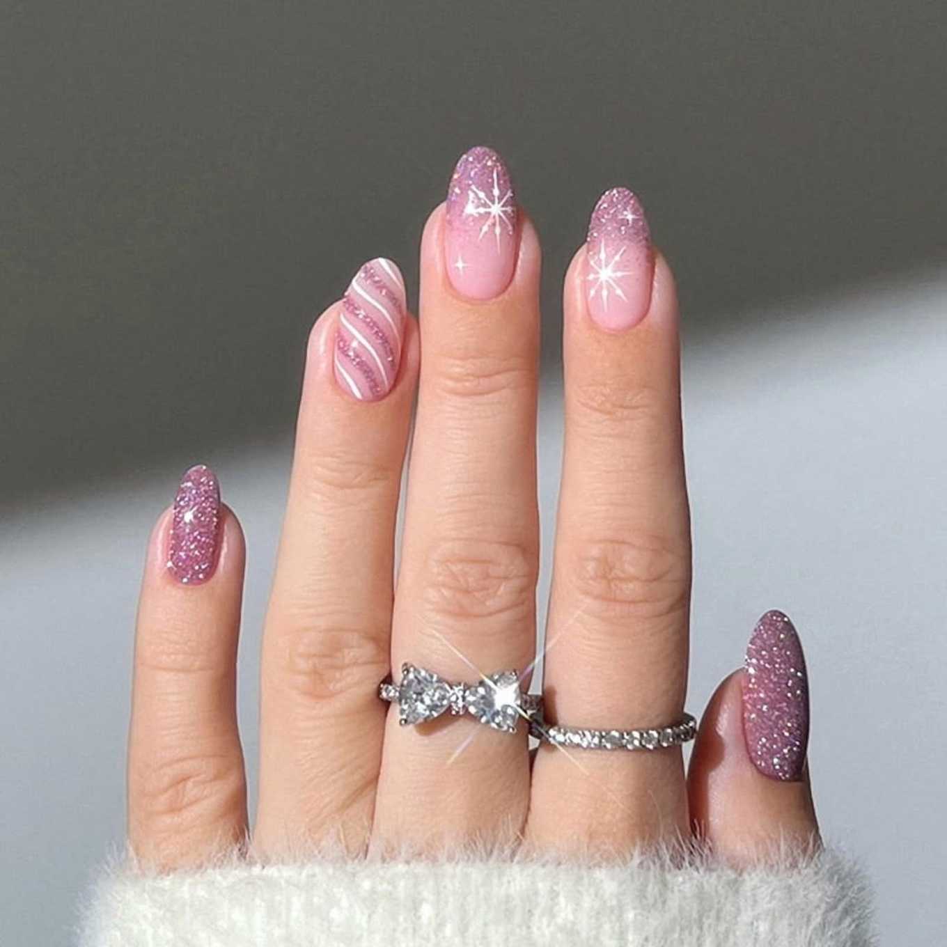 Sparkly Mauve Pink Glitter Almond Christmas Nails