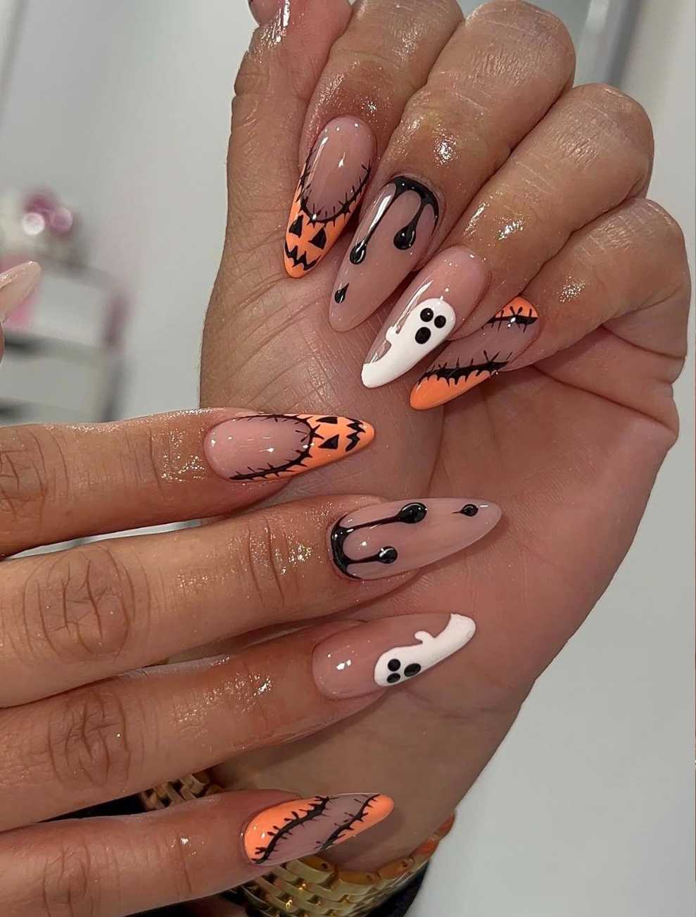 Stitched Pumpkin French Tip And Ghost Almond Halloween Nails