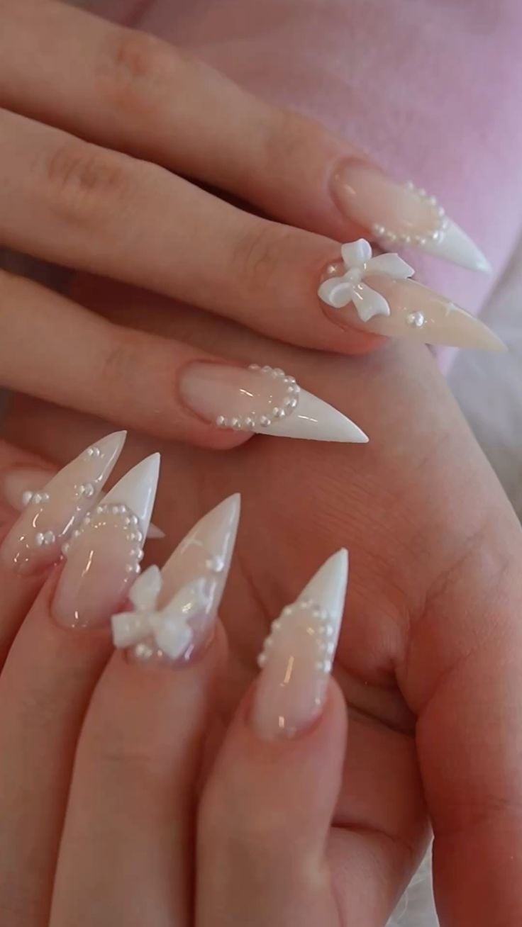 Medium coffin white french tip crystal rhinestone nails with high gloss finish for brides.