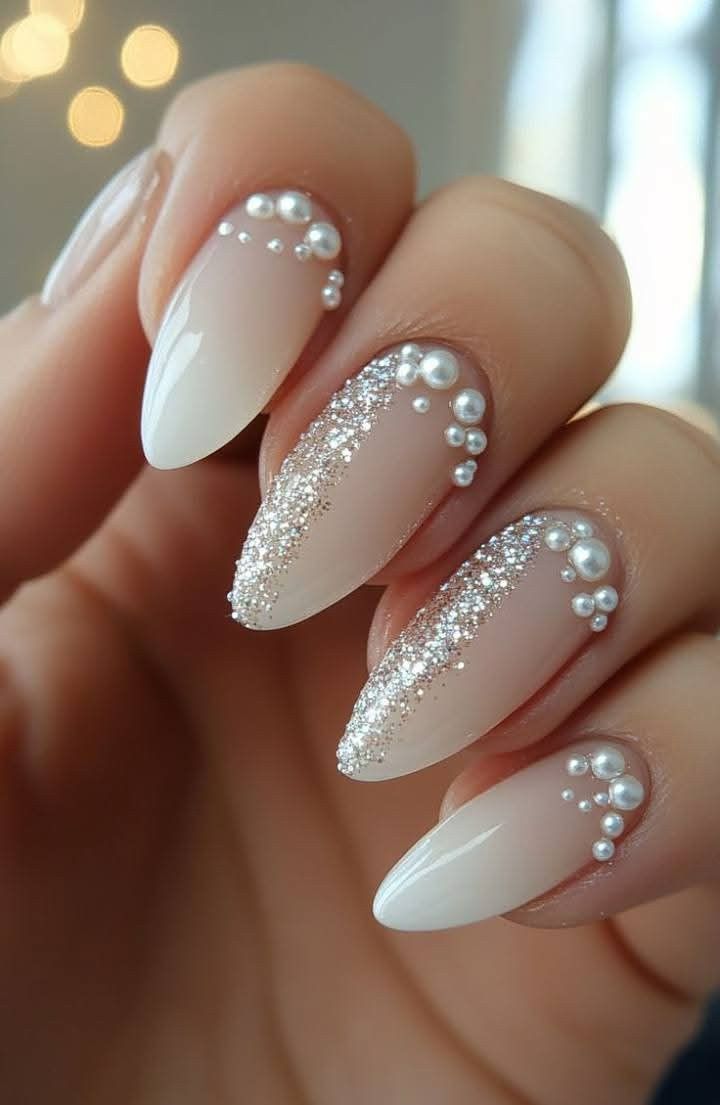 Long coffin opulent white pearl rhinestone nails with ultra gloss finish for formal balls.