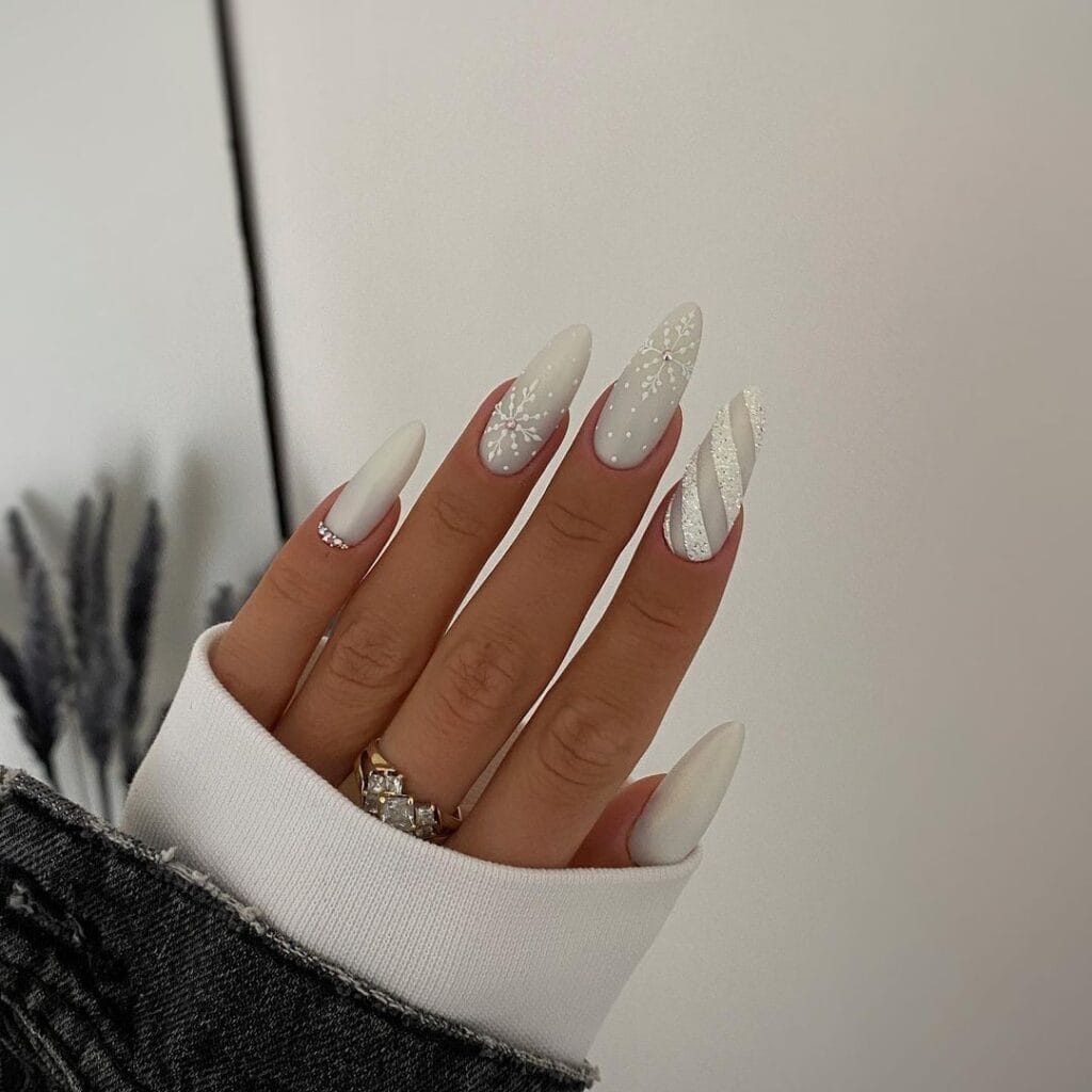 White Snowflake Almond Nails