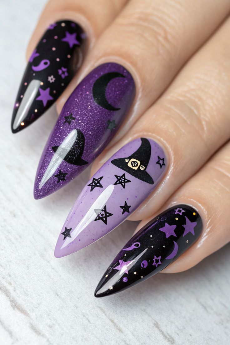 Coffin shaped glossy black nails with emerald green cat-eye and celestial art.
